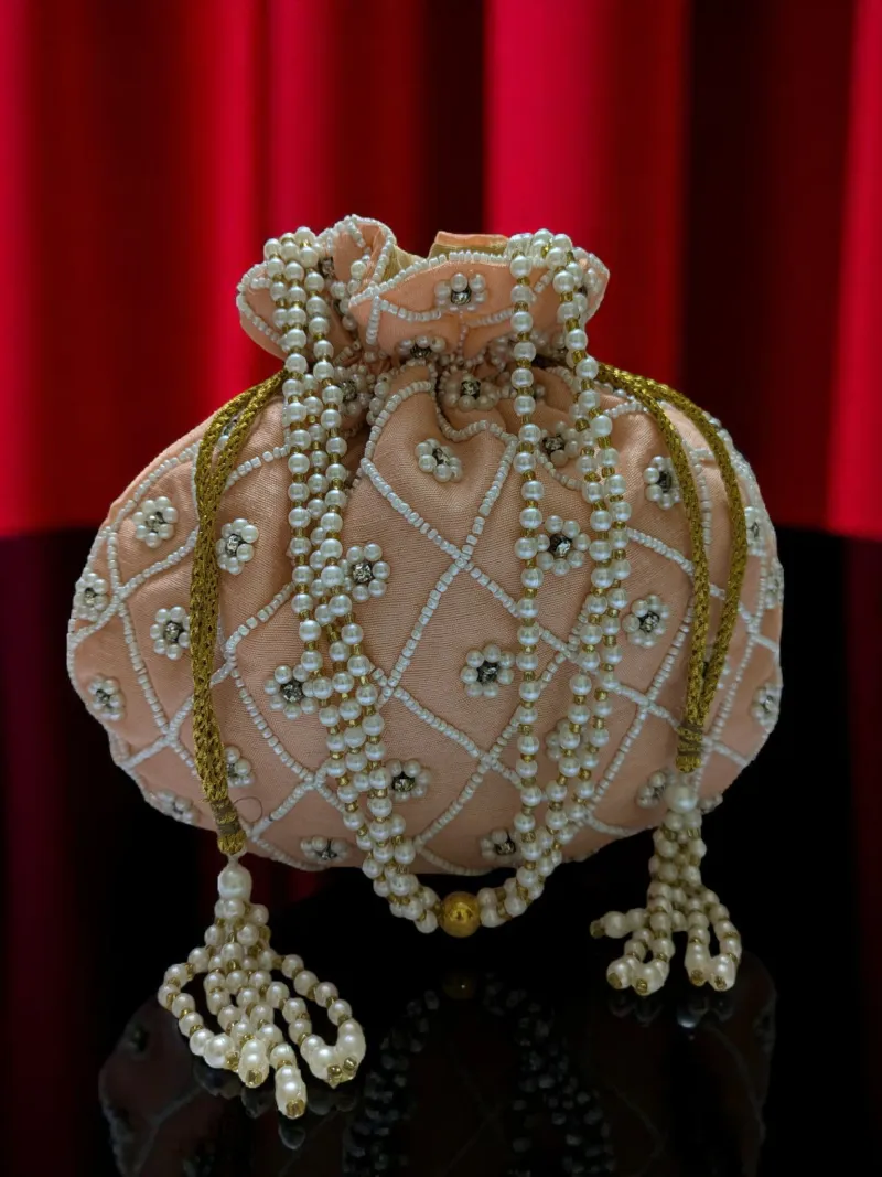 Blush Pearl Tassel Potli Bag - Elegant Evening Clutch